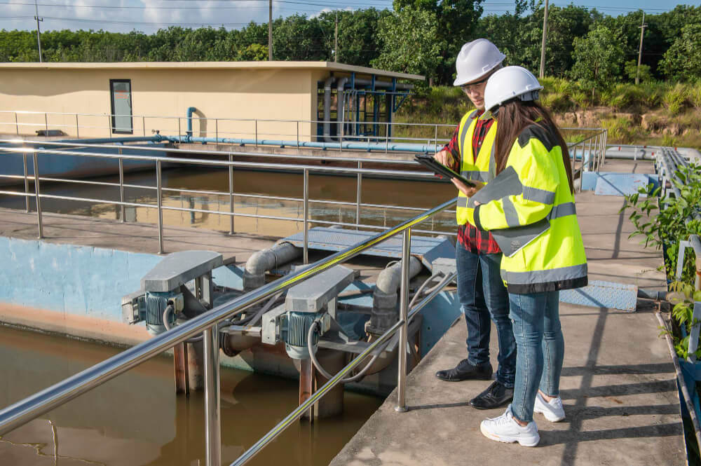 environmental-engineers-work-wastewater-treatment-plantswater-supply-engineering-working-water-recycling-plant-reusetechnicians-engineers-discuss-work-together (1) Water Treatment Solutions QA